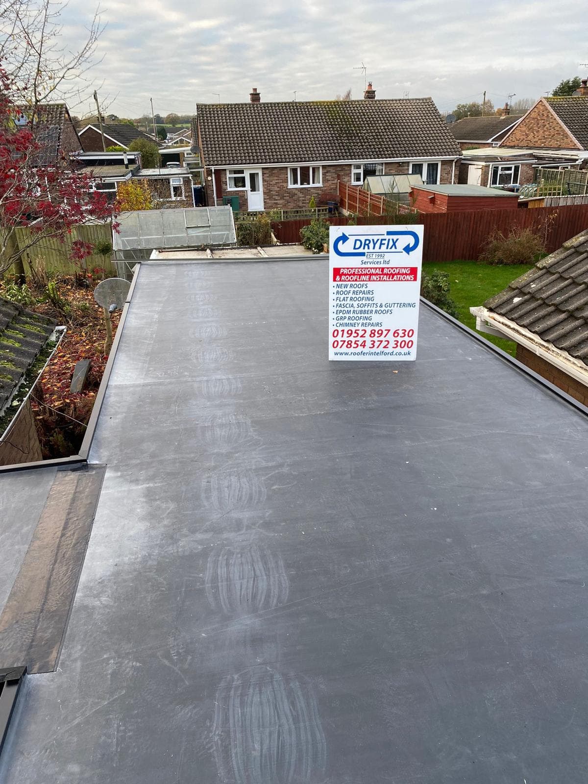 Roofing specialists at work